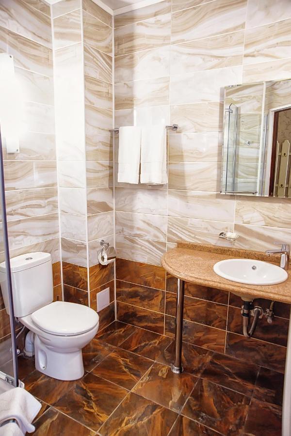 Promenade Park Hotel Шимкент Стая снимка